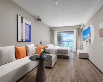 Poltton International Service Apartment Huizhou Shili Silver Beach Yapojiao - Huizhou - Спальня