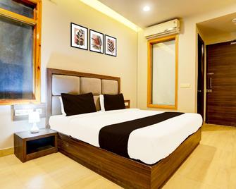 Super Collection O Alwar formerly Hotel Ashoka - Alwar - Bedroom