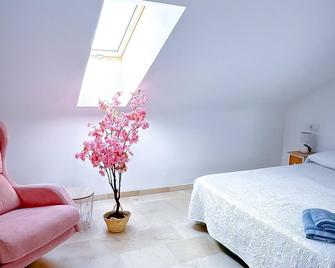 Alojamientos Claus - Almodóvar del Río - Bedroom