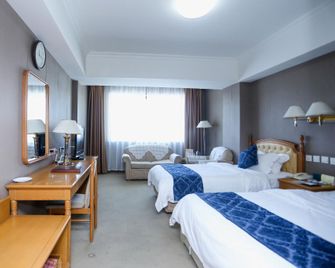 Changchun Yihe Hotel (Jida No.1 Hospital Guilin Road Branch) - Changchun - Makuuhuone