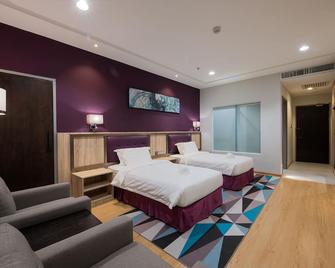 Grand Inhotel Kota Kinabalu - Kota Kinabalu - Bedroom