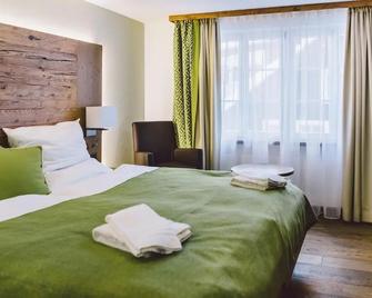 Hotel & Restaurant Zum Schwarzen Bären - Andermatt - Schlafzimmer