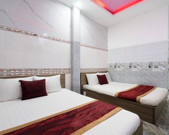 Collection O District 12 - Mau Tim Hotel - Thuan An - Schlafzimmer