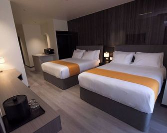 Grand Resort & Residences - בליז סיטי - חדר שינה