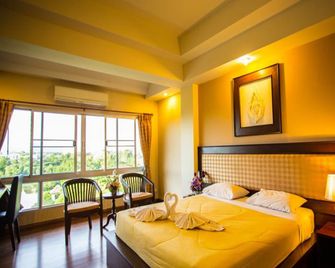 Madina Hotel Rayong - Rayong - Habitación