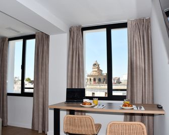 esZentrico Suites Jerez - Jerez de la Frontera - Servicio de la habitación