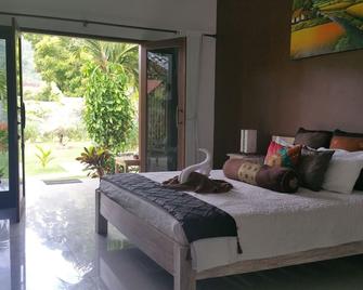 Nalini Resort - Abang - חדר שינה