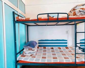 Due West International Youth Hostel - Lhasa - Camera da letto