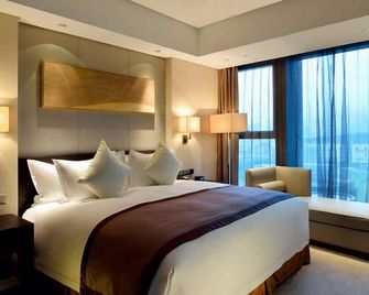 Howard Johnson By Wyndham Ifc Plaza Ningbo - Ningbo - Soveværelse