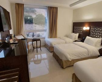 Petra Elite Hotel - Wadi Musa - Schlafzimmer