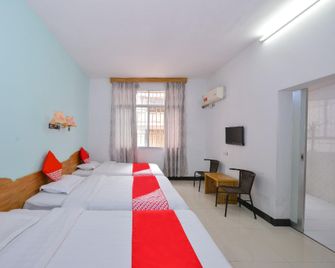 Weather Hotel (Guilin North Railway Station) - גילין - חדר שינה