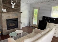 Cabin in the Pines - Watrous - Living room