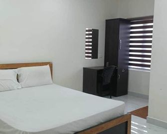 Aman Residency - Thodupuzha - Bedroom