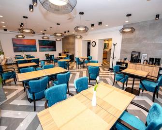 Urban Boutique Hotel Center - Liubliana - Restaurante