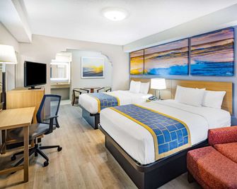 Days Inn & Suites by Wyndham Savannah Midtown - Savannah - Makuuhuone