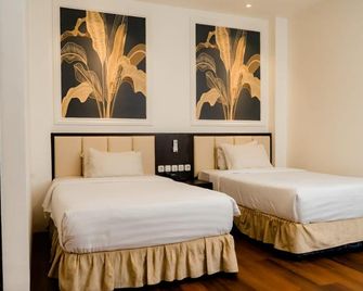 D Blitz Hotel Kendari - Kendari - Bedroom