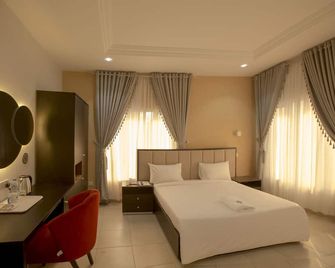 Triple 9 Apartments, Pool & Spa - Abuja - Schlafzimmer