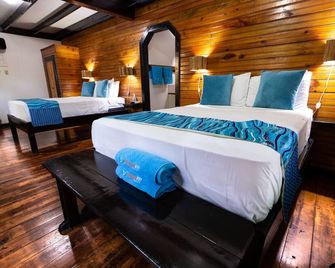 مانجو إن ريزورت - أوتيلا - غرفة نوم