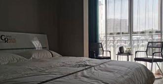 Xiaoyang Hotel - Enshi - Bedroom