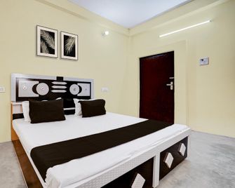 Spot On Yatri Niwas Guest House - Bela Pratapgarh - Bedroom