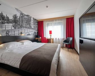 Bastion Hotel Leiden Oegstgeest - Oegstgeest - Schlafzimmer