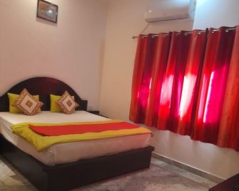 Hotel Khajuraho Inn - Khajuraho - Schlafzimmer
