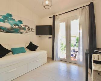 Residence in Costa Rei just 350 meters from the sea - Costa Rei - Sala de estar