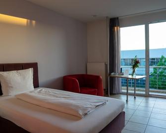 med Apart - Erlangen - Schlafzimmer