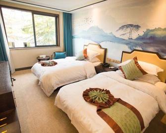 Zhongtie Xinyuan Hotel - Huangshan - Bedroom