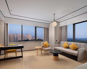 Hilton Garden Inn Zigong High-Tech Zone - Zigong - Sala de estar