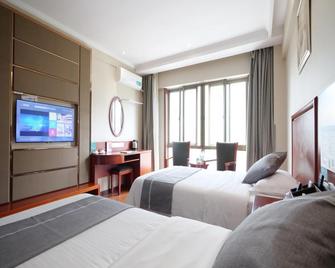 Greentree Inn Chizhou Qingyang Miaoqian Road Rongxing Building Business Hotel - Chizhou - Bedroom