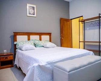 بوجومبورا هوتل آند أبارتمنت - بوجومبورا - غرفة نوم