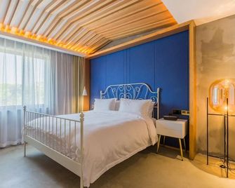 Tardy courtyard (hangzhou baima lake store) - Hangzhou - Habitación