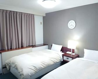 Hotel Crown Hills Imabari - Imabari - Schlafzimmer