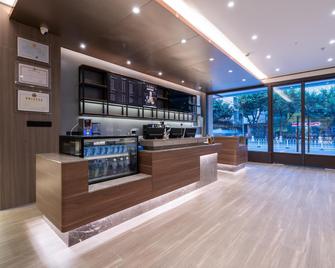 Hanting Hotel Shaoguan Bainian East Street Fengcai Building - Shaoguan - Front desk