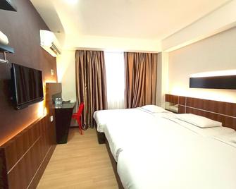 OYO 90091 Hi Inn - Sibu - Habitación