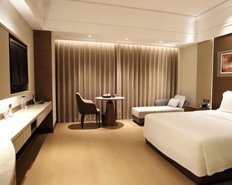 Jinjiang Shiji Fliport Hotel - Quanzhou - Bedroom