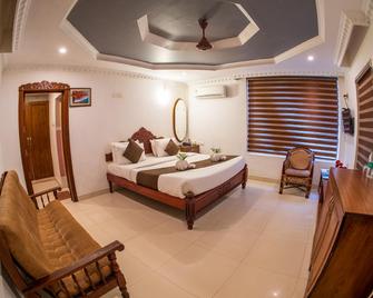 بلاك بيتش ريزورت - فاركالا - غرفة نوم