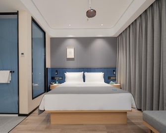 Lanou Hotel Yangquan Stadium - Yangquan - Спальня