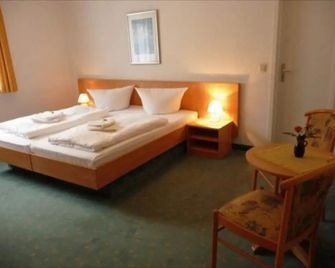 Hotel Garni am Schlosspark - Wernigerode - Bedroom