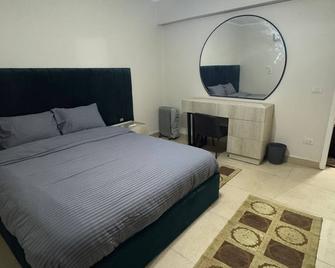 Charming 2-bedroom apartment with AC, WiFi in serene Cairo Governorate - Madinat Coraya