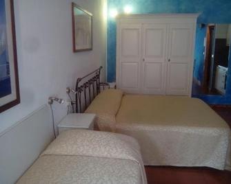 Country Hotel Residence Da Pilade - Capoliveri - Спальня