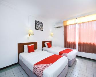 Super OYO 1018 Telang Usan Hotel Miri - Miri - Bedroom