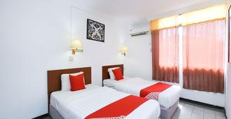Super OYO 1018 Telang Usan Hotel Miri - Miri - Bedroom