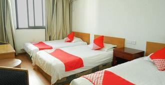Quzhou Zhenxing Hotel - Quzhou - Bedroom