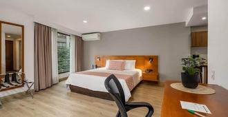 Leblón Suites Hotel - Medellín - Yatak Odası