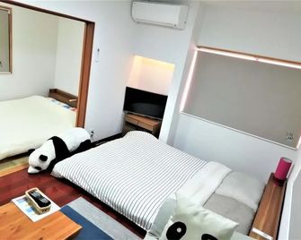 パンダステイ岡山 - 岡山市 - 寝室