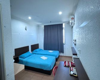 OYO 90559 우물 모텔 C 마트 - 아라우 - 침실