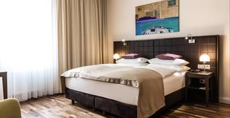 Hotel Sandwirth - קלגנפורט - חדר שינה