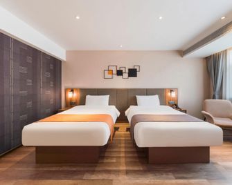 Home Inn Plus Weifang Minzhu Street Gudemao - Weifang - Bedroom